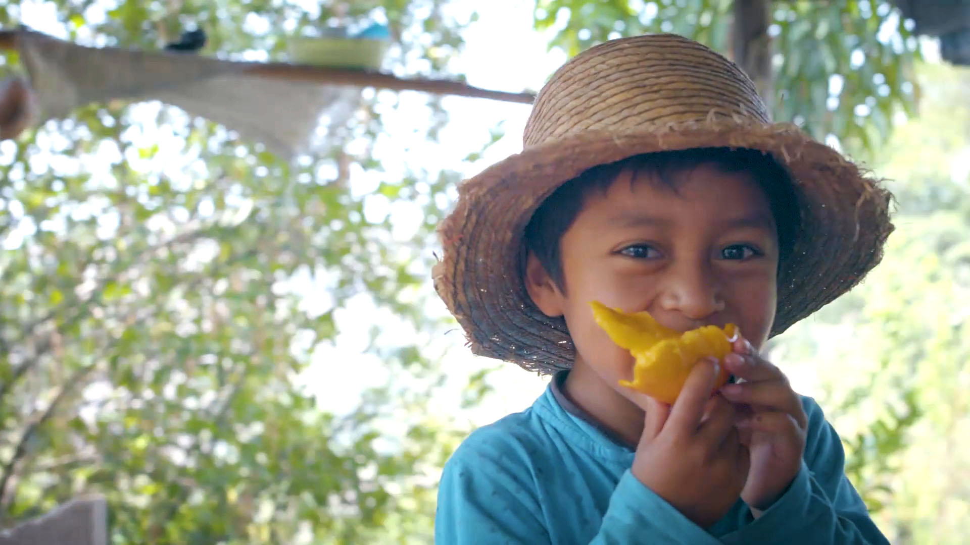 child eating fruit