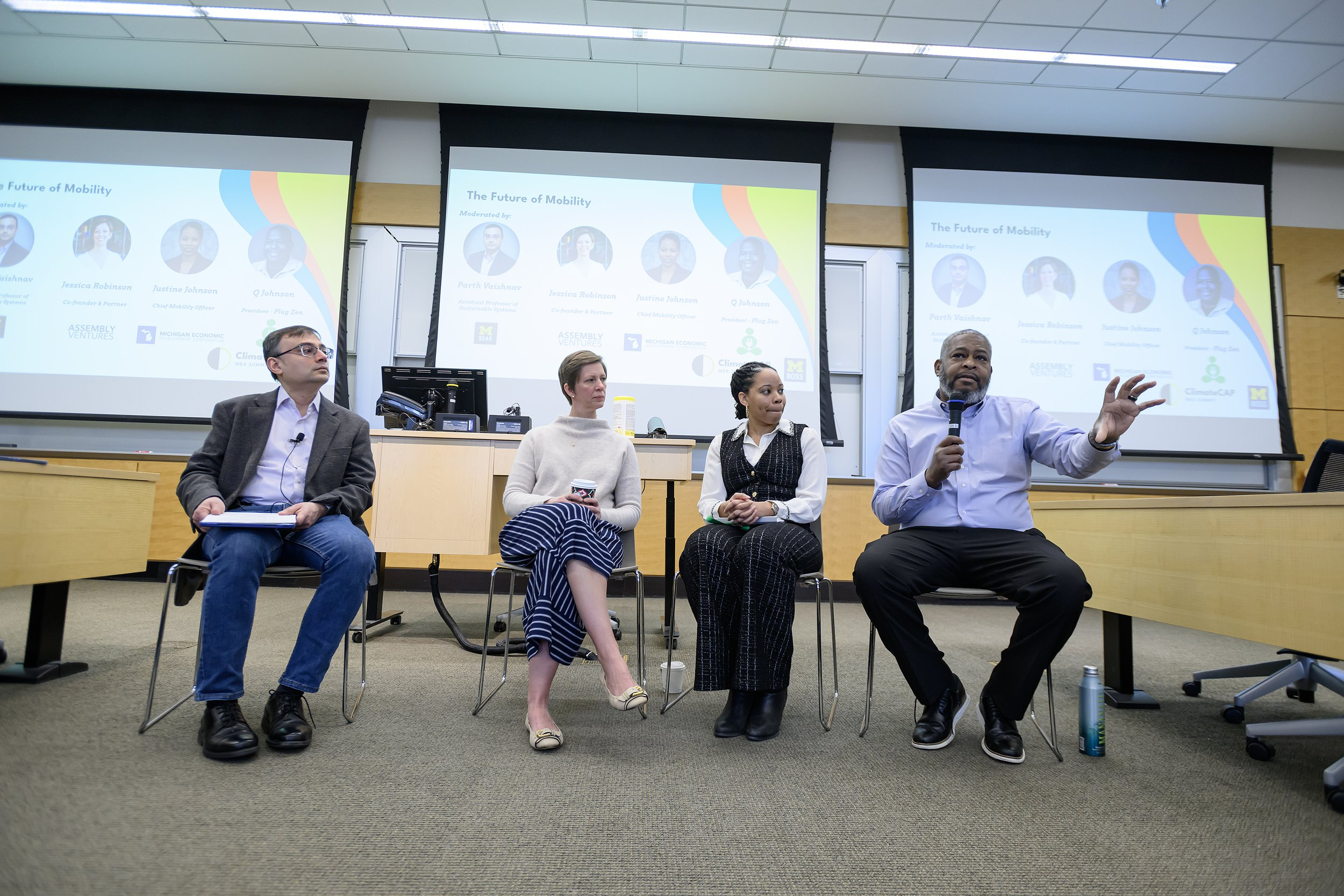 Parth Vaishnav (far left) guiding a panel discussion on the future of mobility.